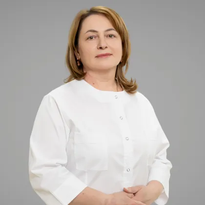 Dr. Tihon Stela